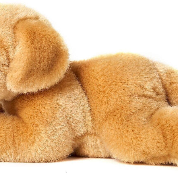 Golden Retriever puppy, lying down - cuddly/plush toy