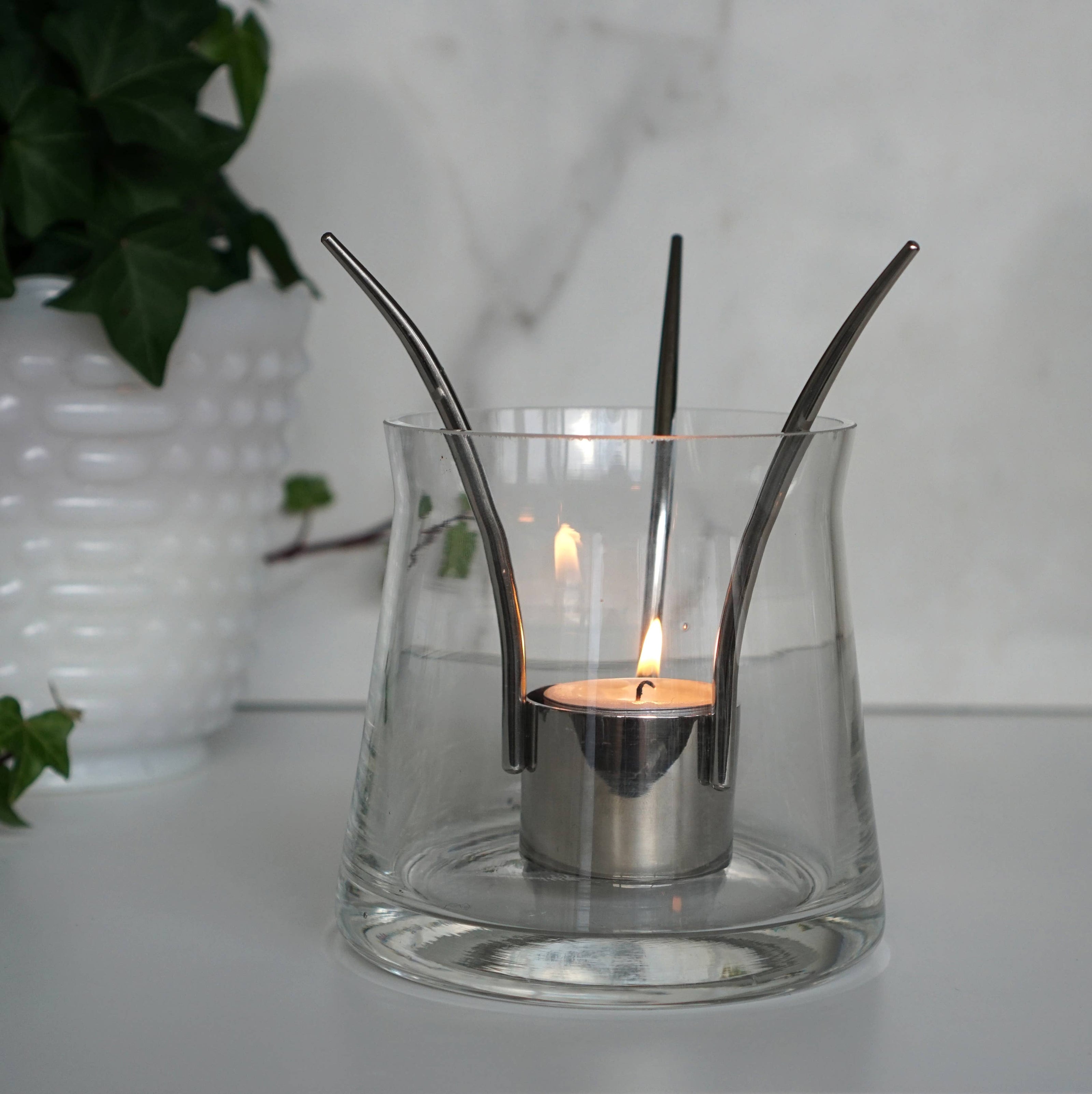 Up-Side-Down Candleholder: Polished stainless steel / 14x12 cm