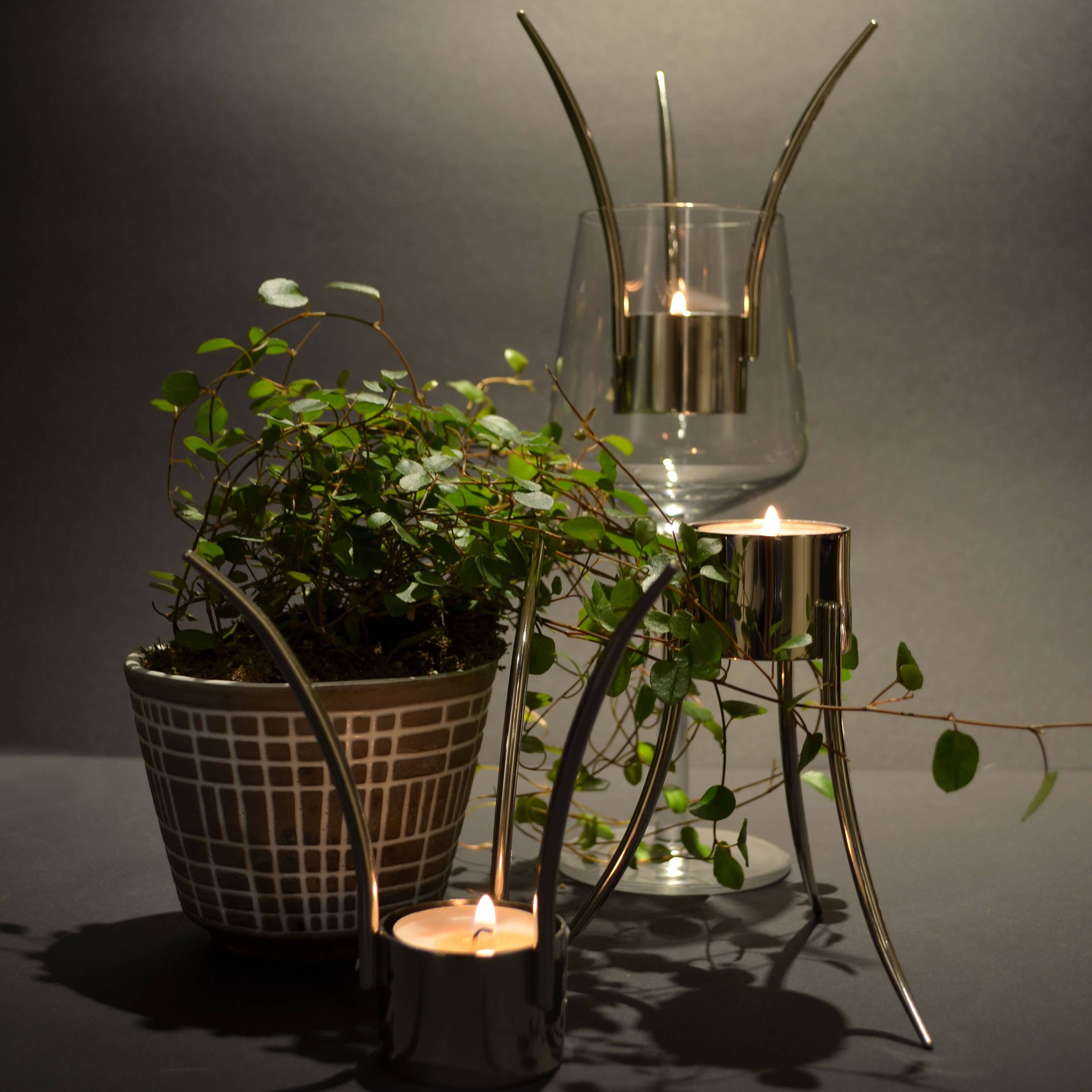 Up-Side-Down Candleholder: Polished stainless steel / 14x12 cm