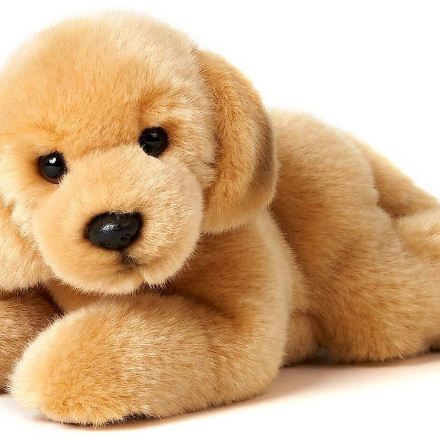 Golden Retriever puppy, lying down - cuddly/plush toy