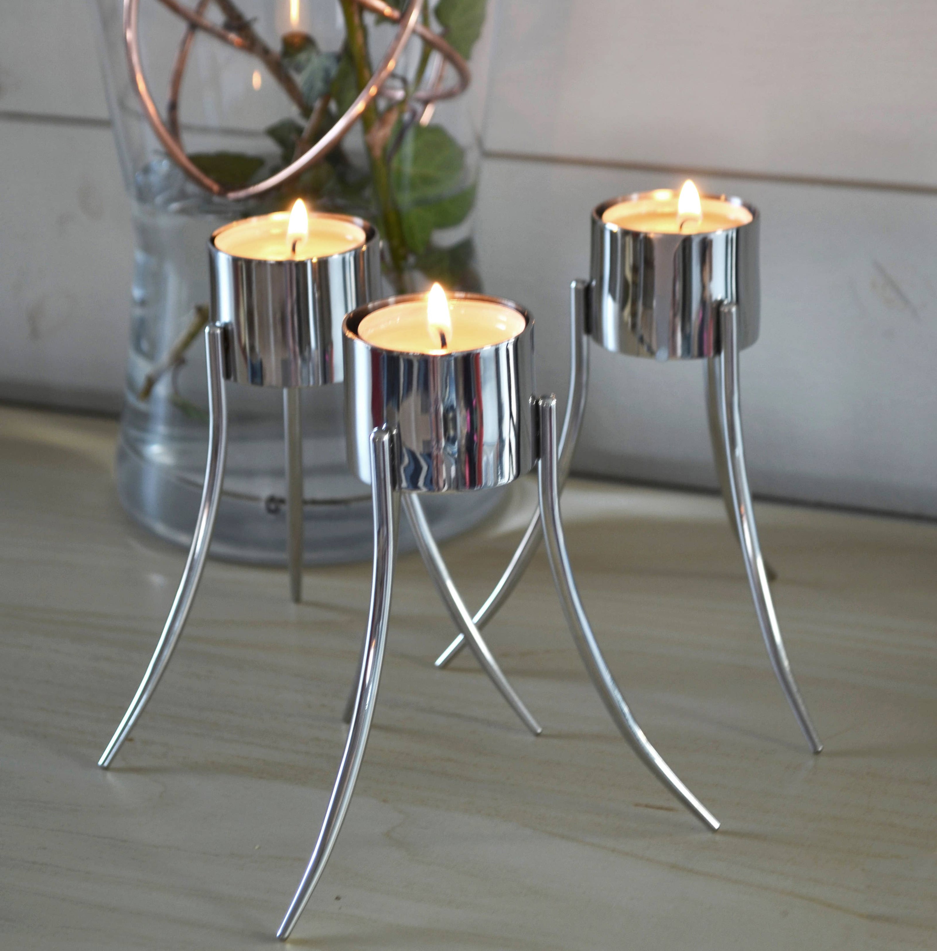Up-Side-Down Candleholder: Polished stainless steel / 14x12 cm