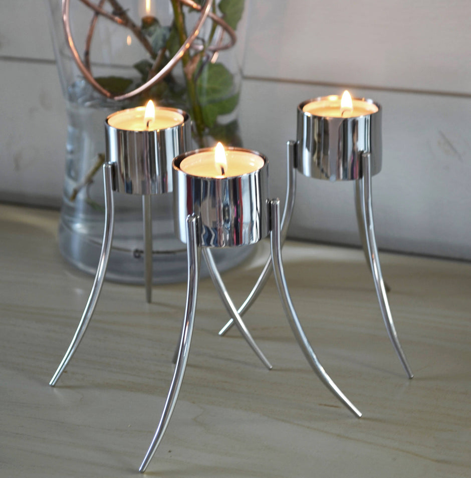 Up-Side-Down Candleholder: Polished stainless steel / 14x12 cm