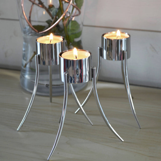 Up-Side-Down Candleholder: Polished stainless steel / 14x12 cm